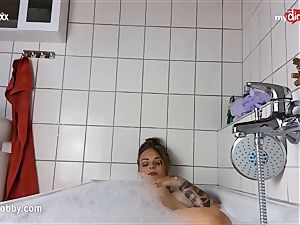 My muddy leisure activity - tattooed babe jerks in tub