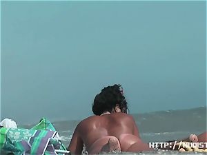 naturist beach movie presents superb looking nude honies